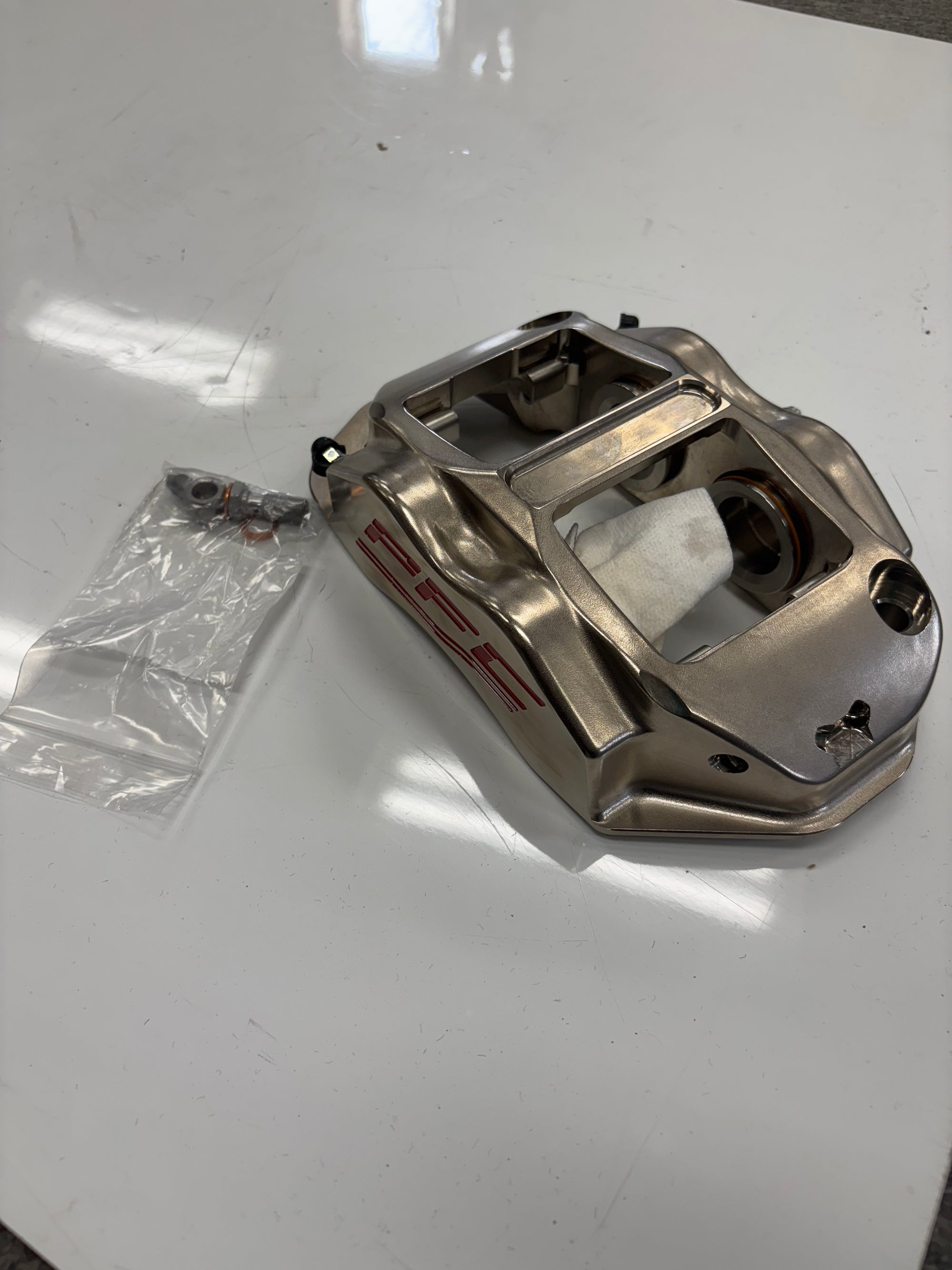USED (NEW) PFC BRAKES ZR94 BRAKE CALIPER (MISSING PISTON)